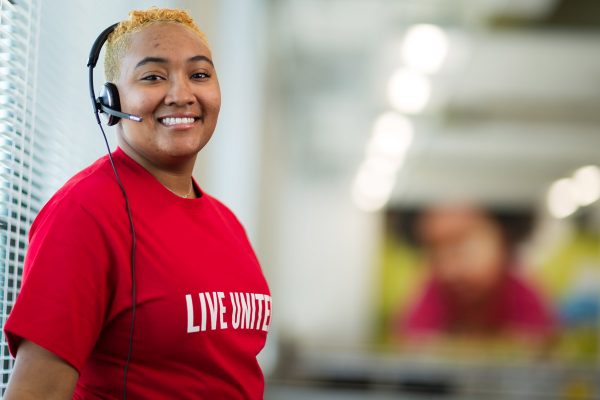 Young women wearing red live united shirt from United Way of York County, SC