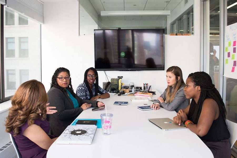 Group of women sitting at table discussing the Workplace Giving Campaign for United Way Rock Hill SC